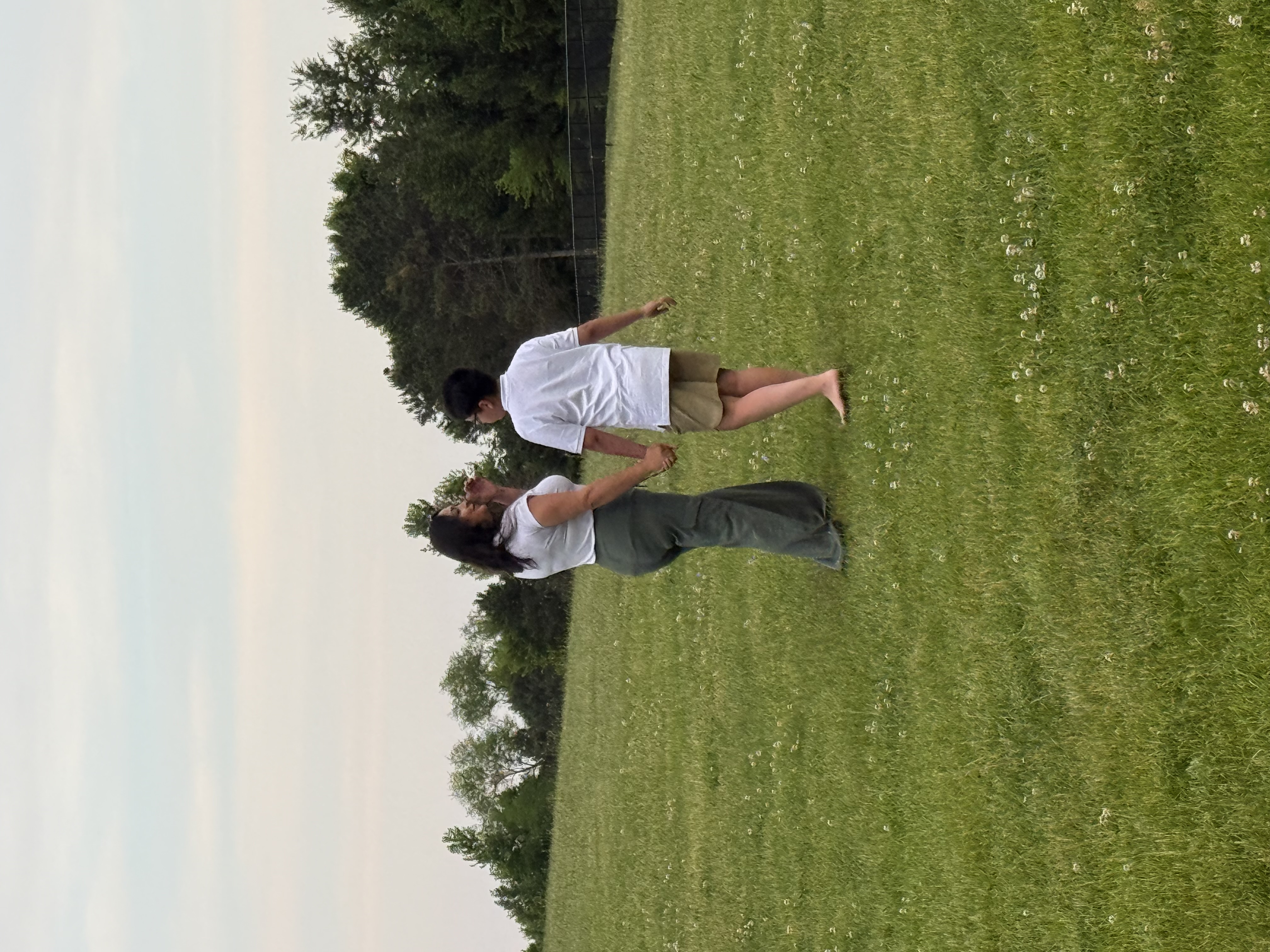Diana and her son together in an open field